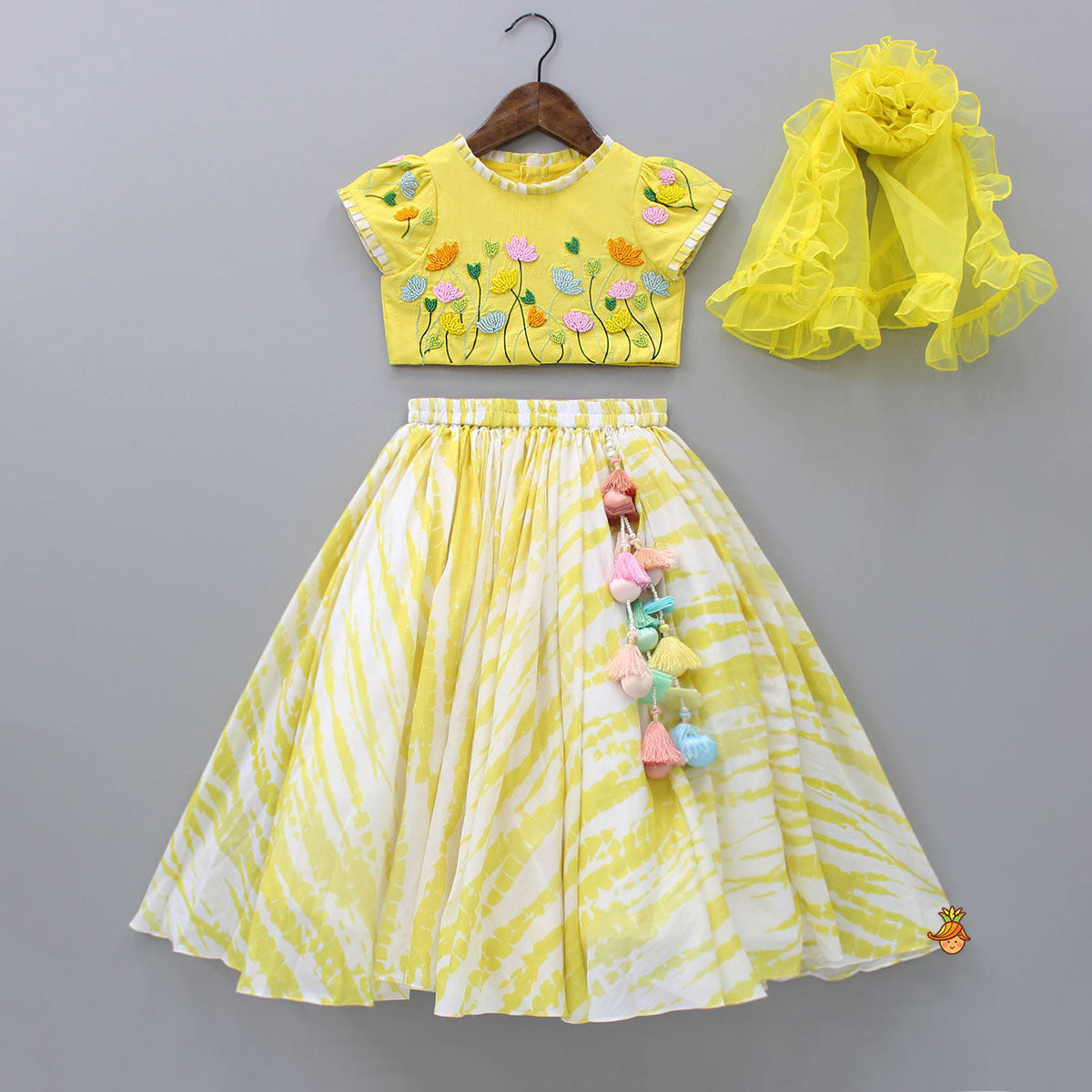 Pre Order: Beaded Yellow Top And Shibori Printed Lehenga With Ruffle Dupatta