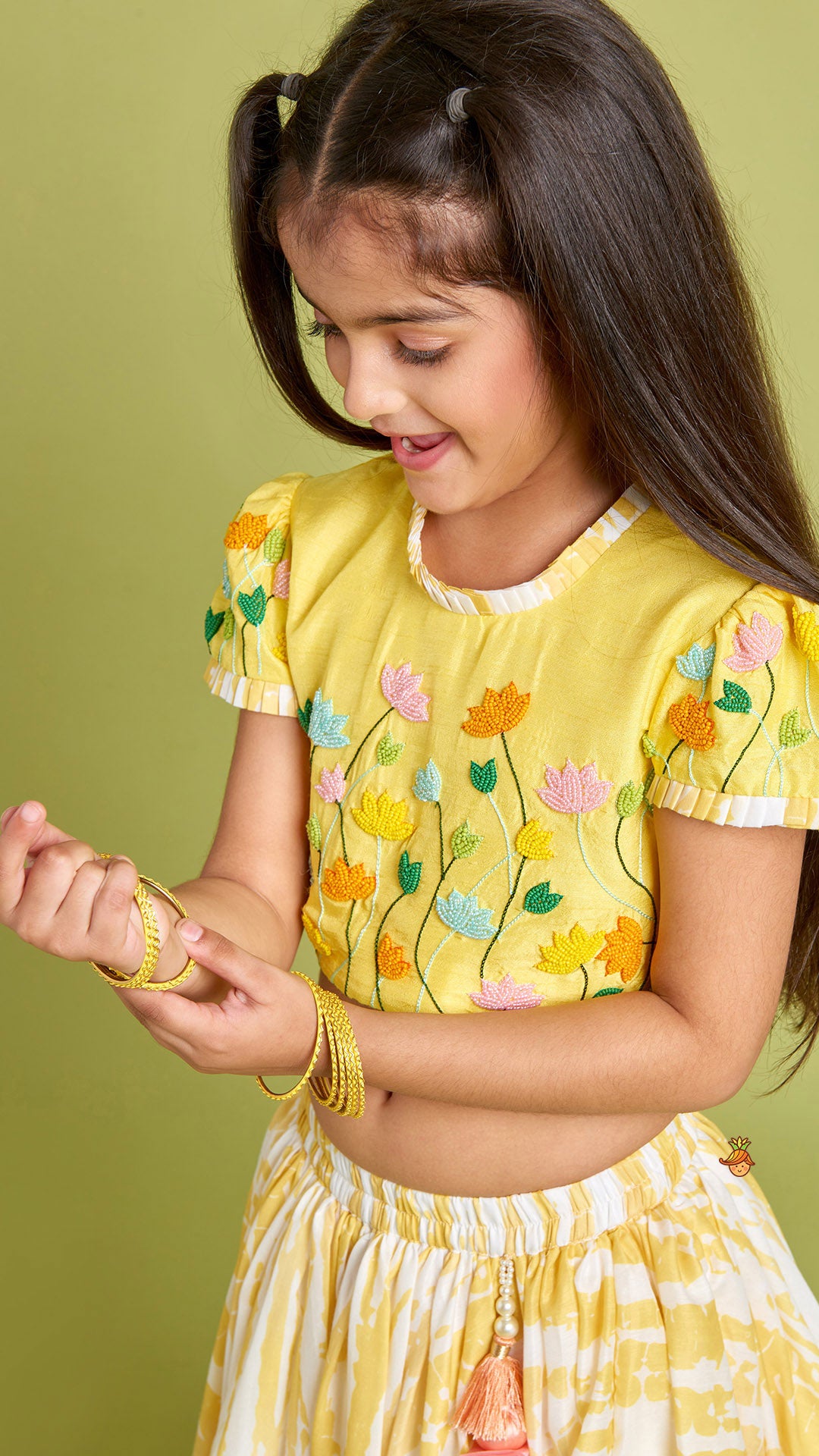 Pre Order: Beaded Yellow Top And Shibori Printed Lehenga With Ruffle Dupatta