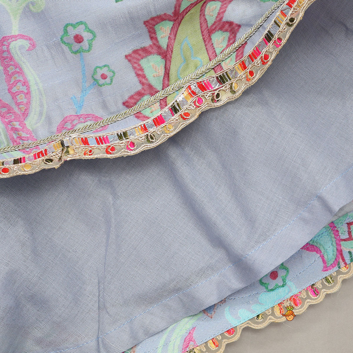 Pre Order: Zardozi Embroidered Pleated Hem Blue Top And Lehenga With Checks Hair Band