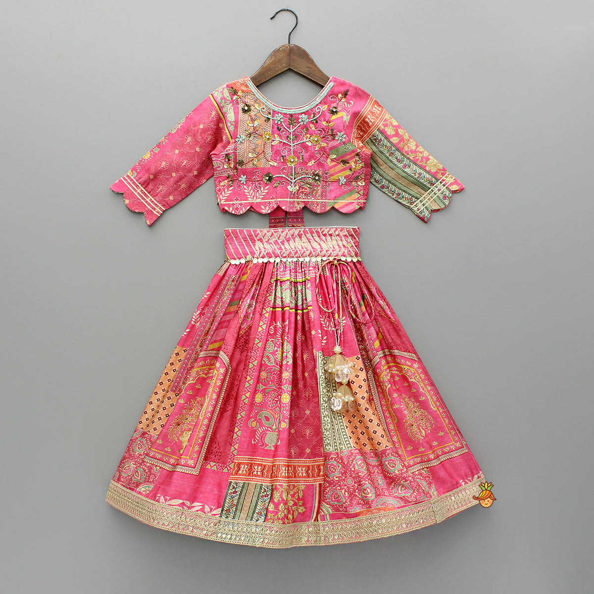 Pre Order: Stunning Pink Raw Silk Scalloped Top And Pearly Tassels Enhanced Lehenga