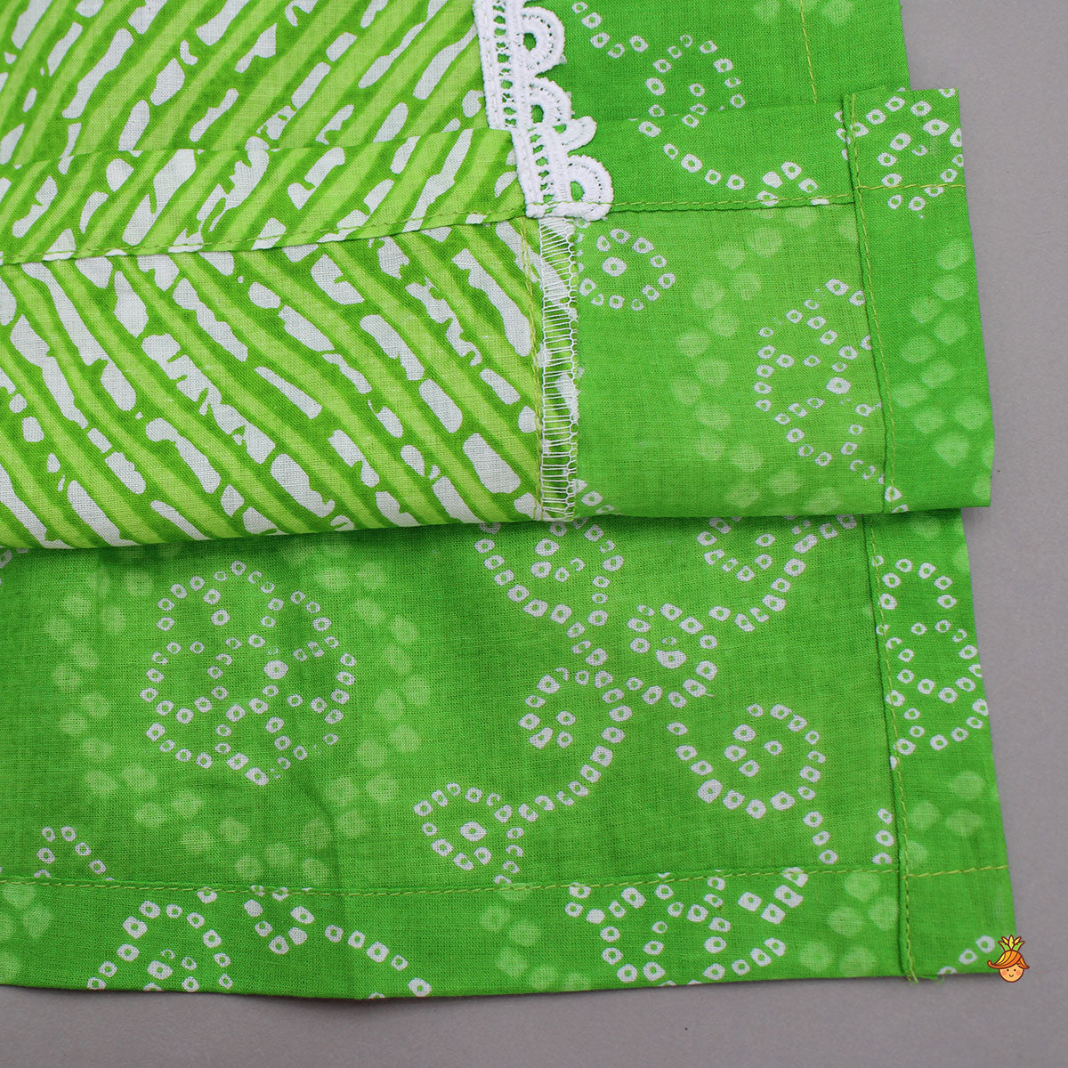 Pre Order: Bandhani And Leheriya Printed Green Kurti And Palazzo With Net Dupatta