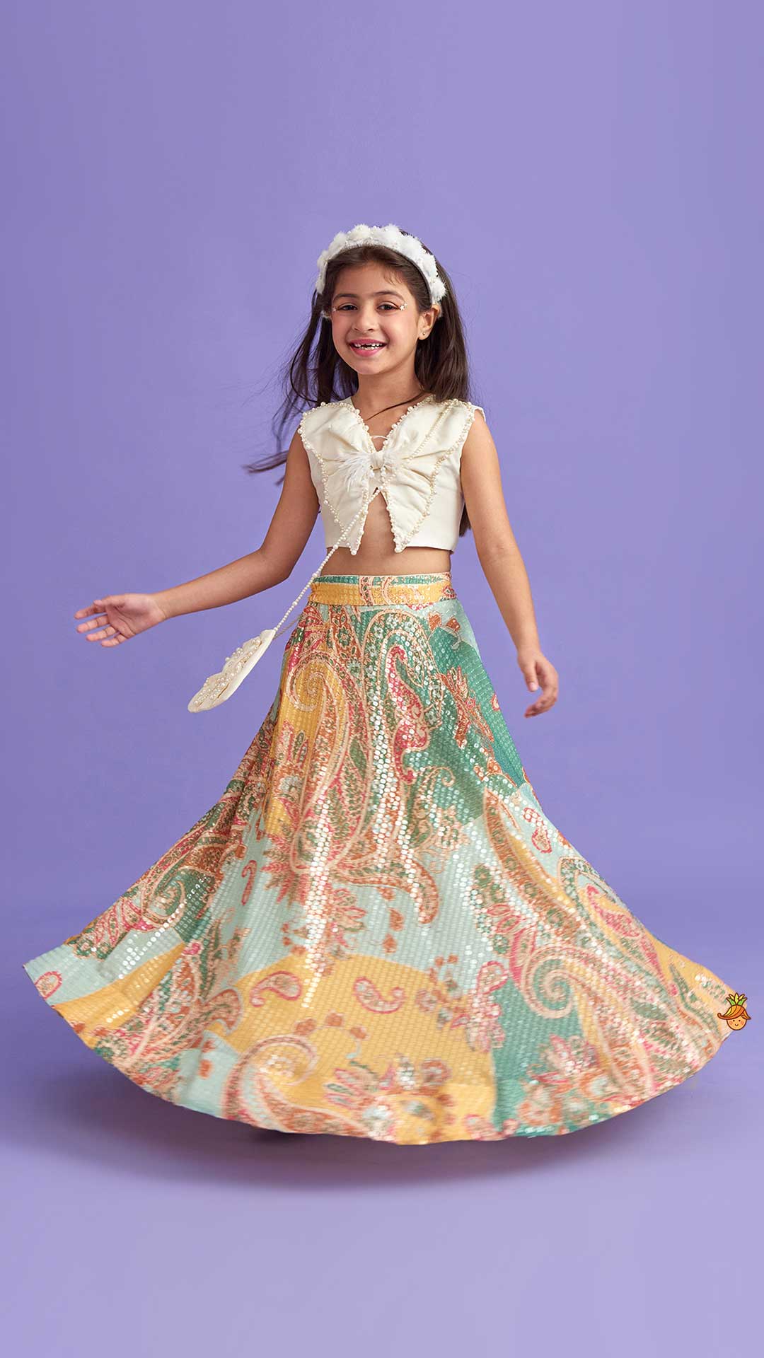 Pre Order: Elegant Pearl Embroidered Butterfly Top And Sequins Work Lehenga With Sling Bag