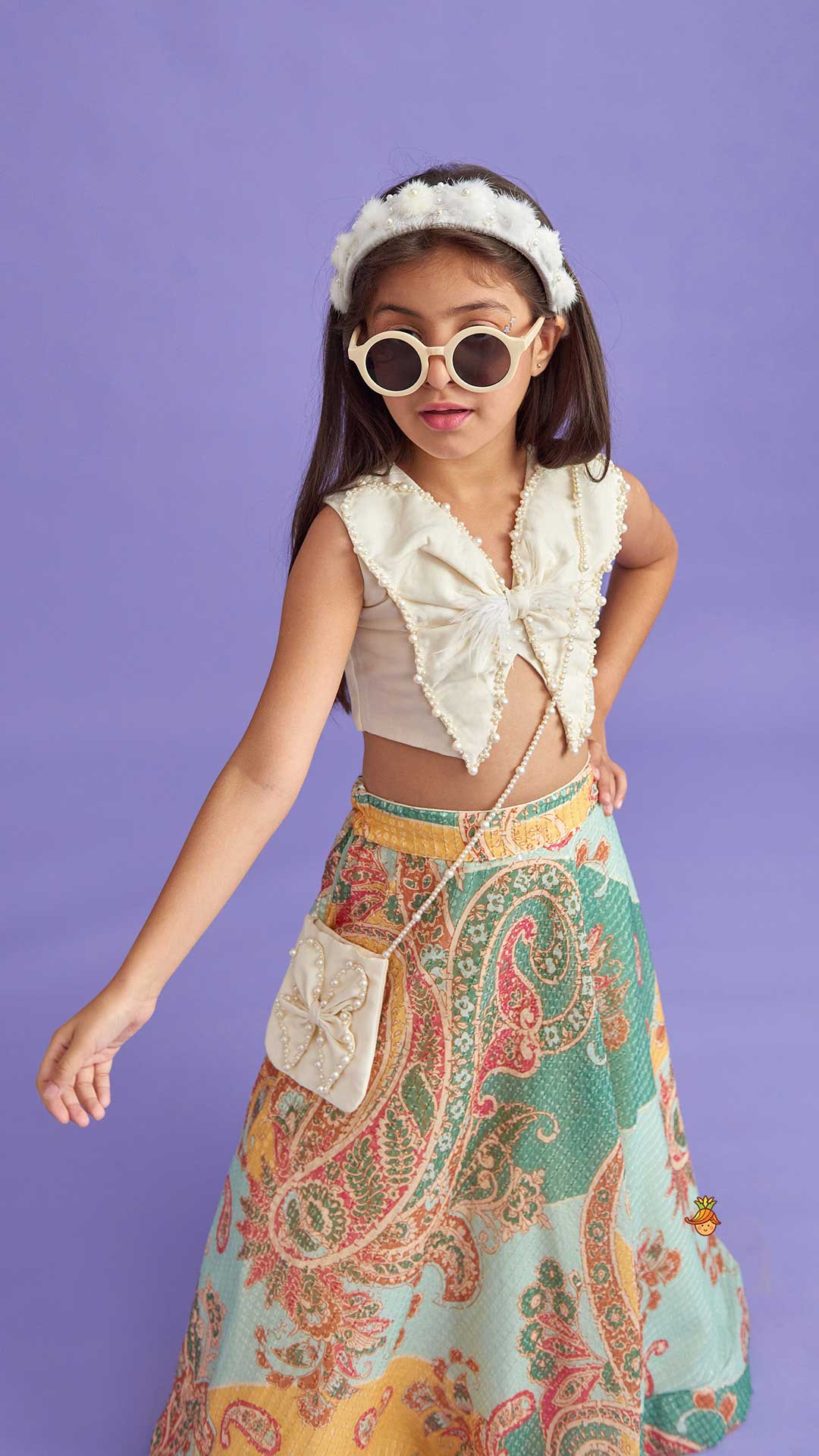 Pre Order: Elegant Pearl Embroidered Butterfly Top And Sequins Work Lehenga With Sling Bag