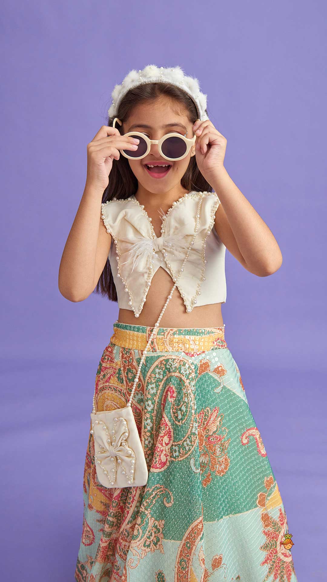 Pre Order: Elegant Pearl Embroidered Butterfly Top And Sequins Work Lehenga With Sling Bag