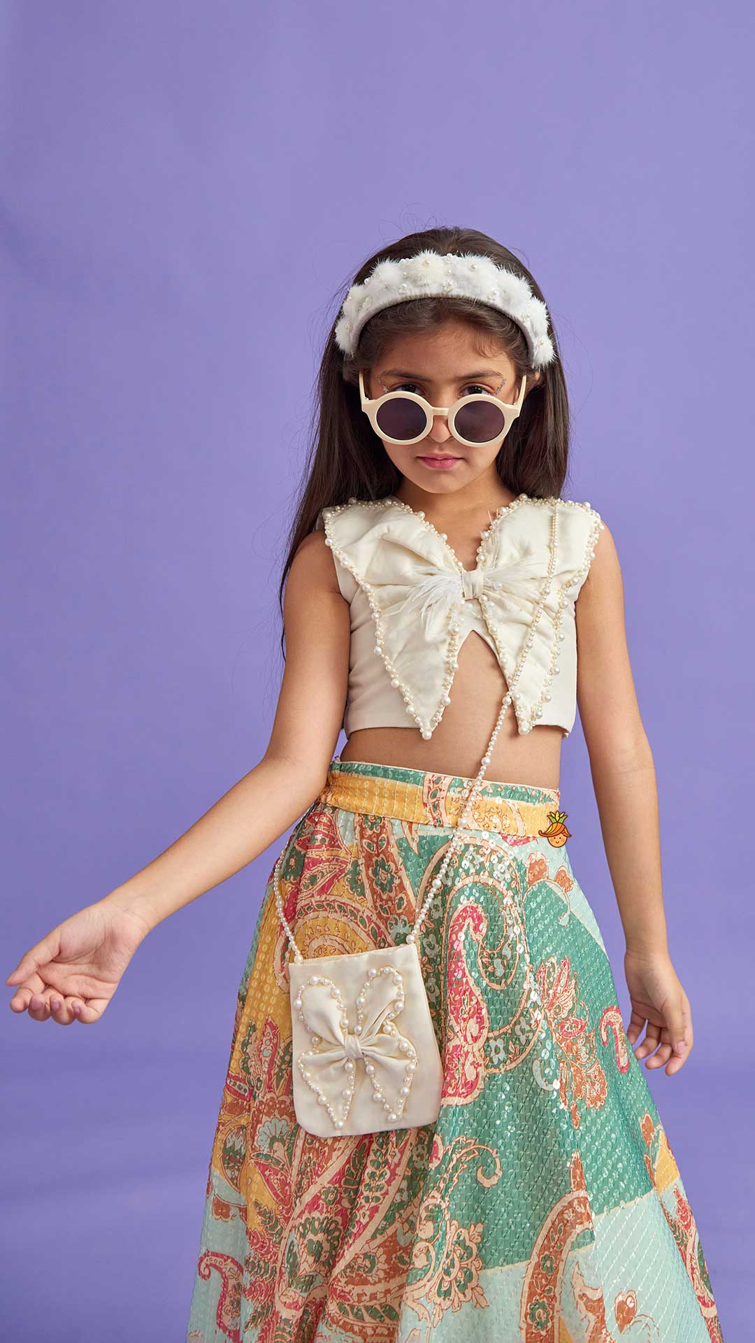 Pre Order: Elegant Pearl Embroidered Butterfly Top And Sequins Work Lehenga With Sling Bag