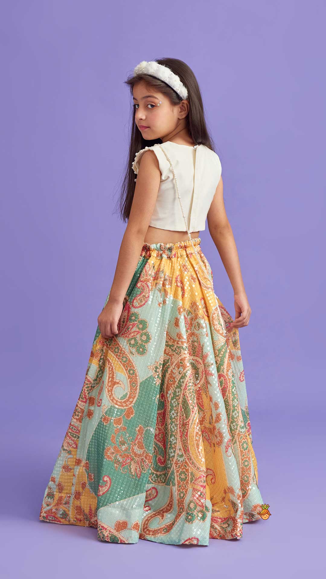 Pre Order: Elegant Pearl Embroidered Butterfly Top And Sequins Work Lehenga With Sling Bag