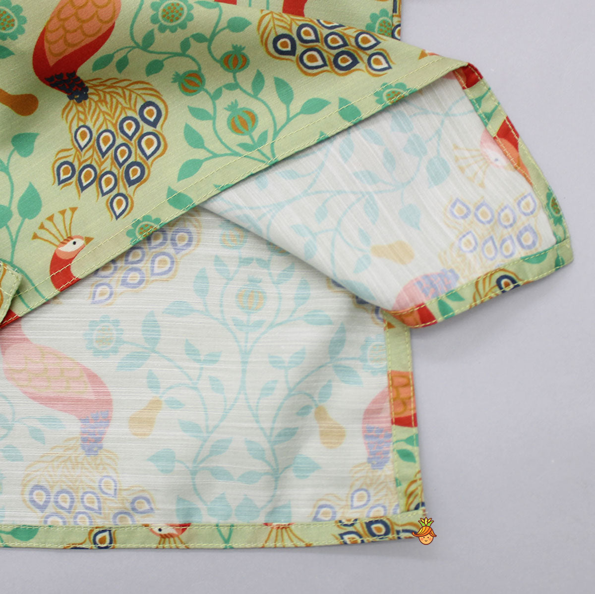 Pre Order: Peacock Printed Kurta And Dhoti With Matching Mukut