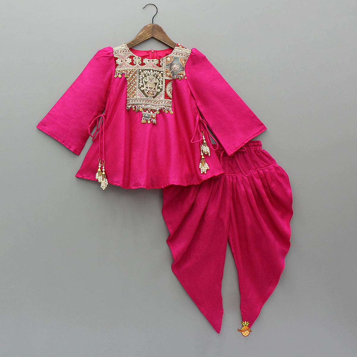 Pre Order: Embroidered Yoke Tassels Enhanced Pink Kurti And Dhoti