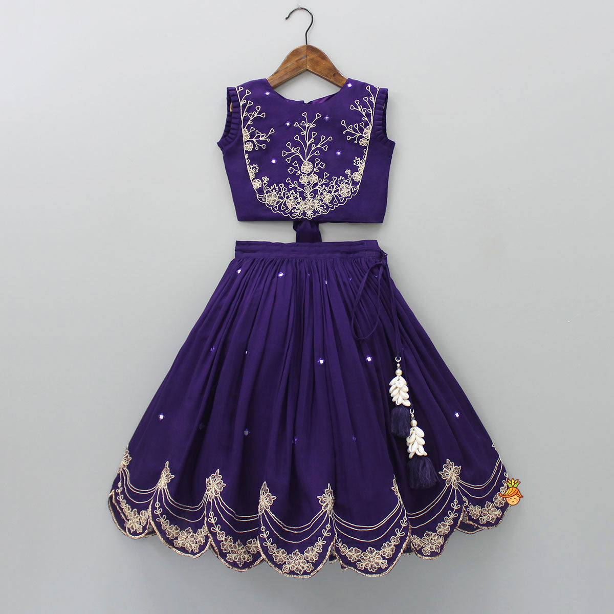 Pre Order: Dual Back Knot Detail Purple Top And Tassels Enhanced Lehenga