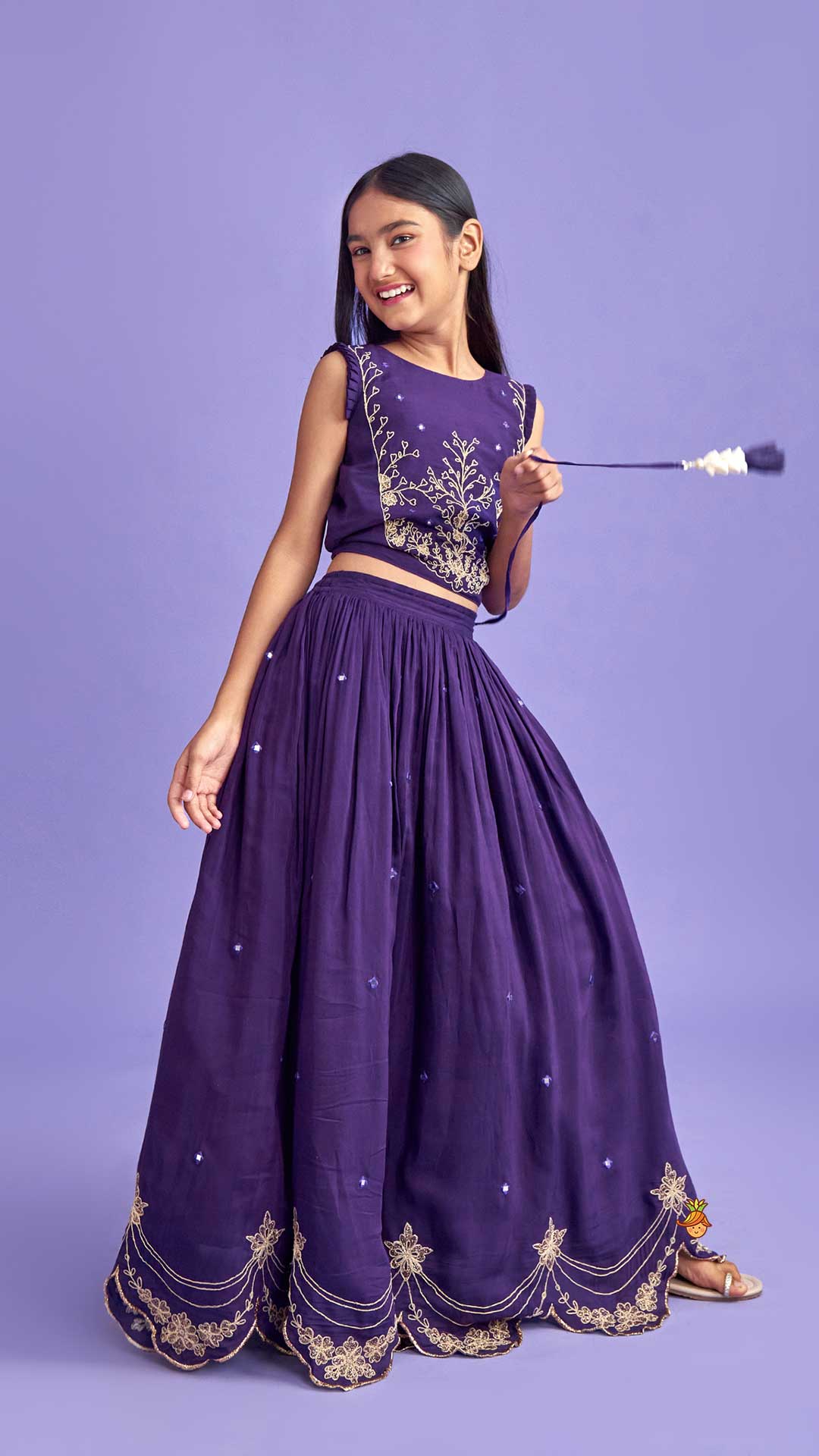 Pre Order: Dual Back Knot Detail Purple Top And Tassels Enhanced Lehenga