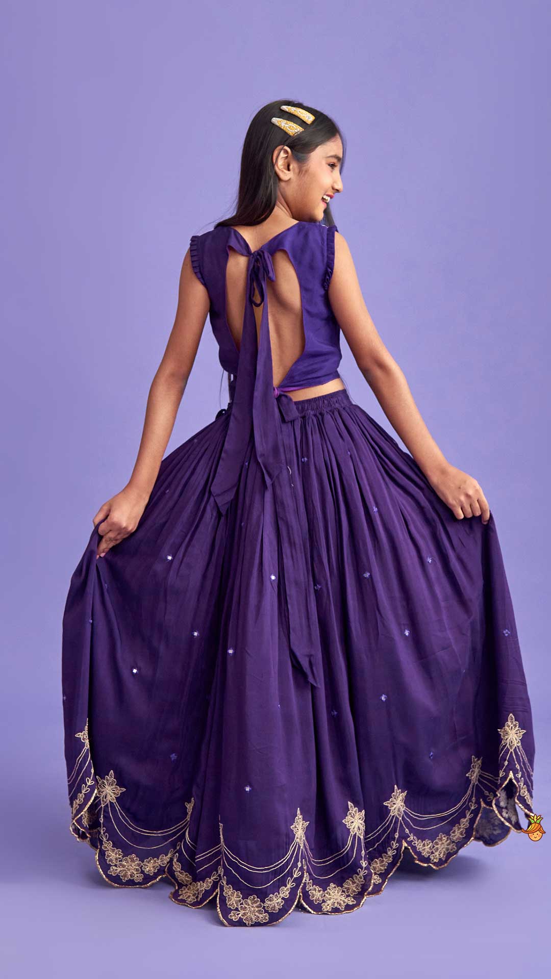 Pre Order: Dual Back Knot Detail Purple Top And Tassels Enhanced Lehenga