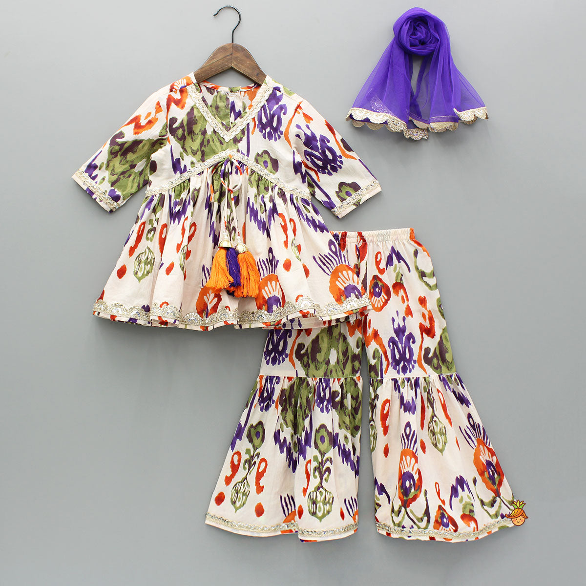 Pre Order: Tassels Enhanced Multicolour Printed Kurti And Sharara With Scalloped Lace Detail Dupatta