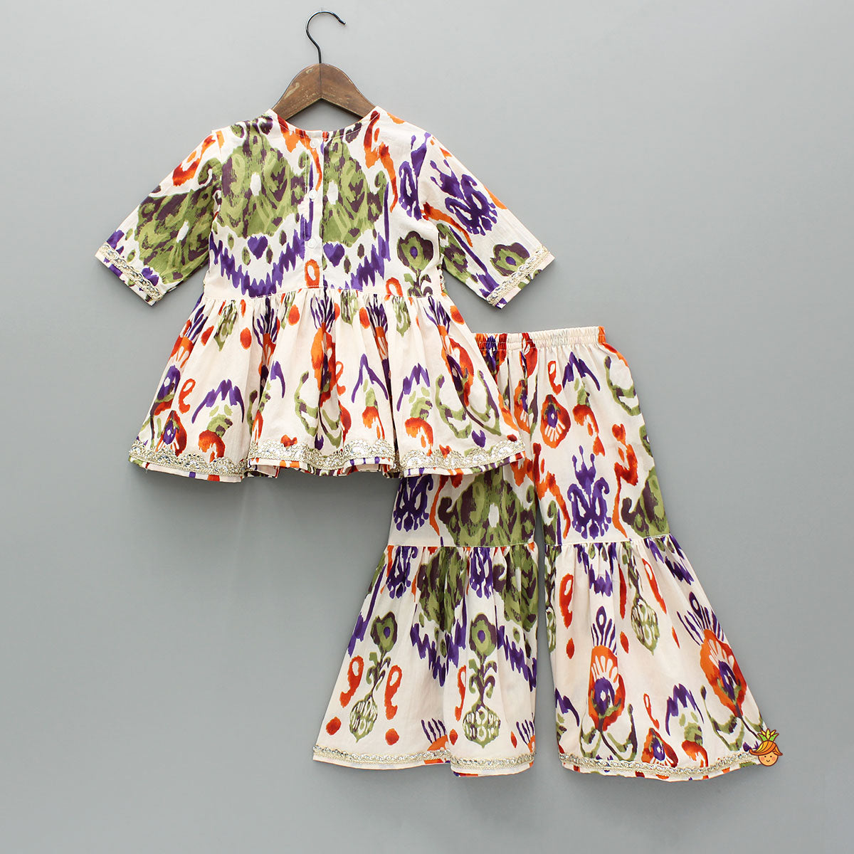 Pre Order: Tassels Enhanced Multicolour Printed Kurti And Sharara With Scalloped Lace Detail Dupatta