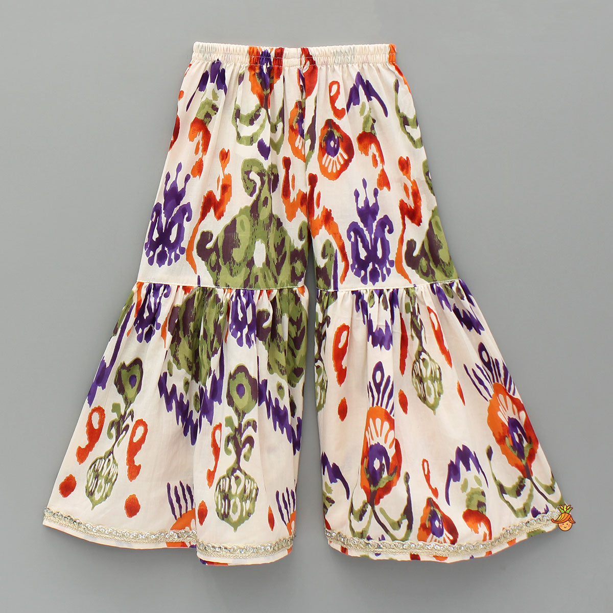 Pre Order: Tassels Enhanced Multicolour Printed Kurti And Sharara With Scalloped Lace Detail Dupatta