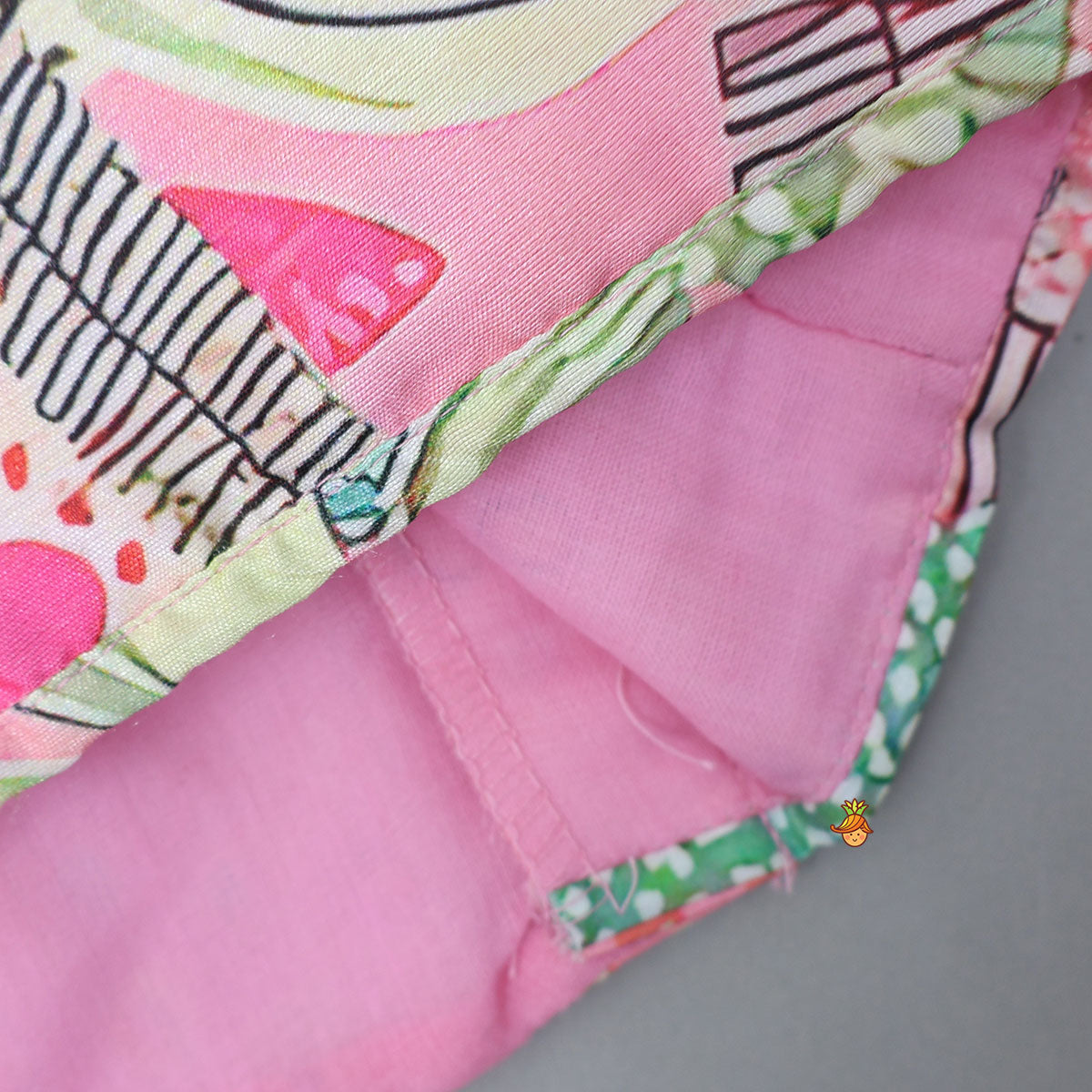 Pre Order: Buttons Adorned Pink Top And Scalloped Lace Work Floral Lehenga