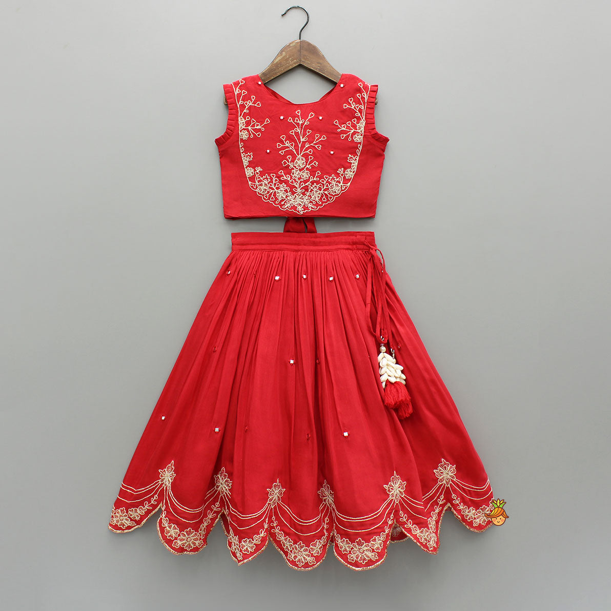 Pre Order: Dual Back Knot Detail Red Top And Tassels Enhanced Lehenga