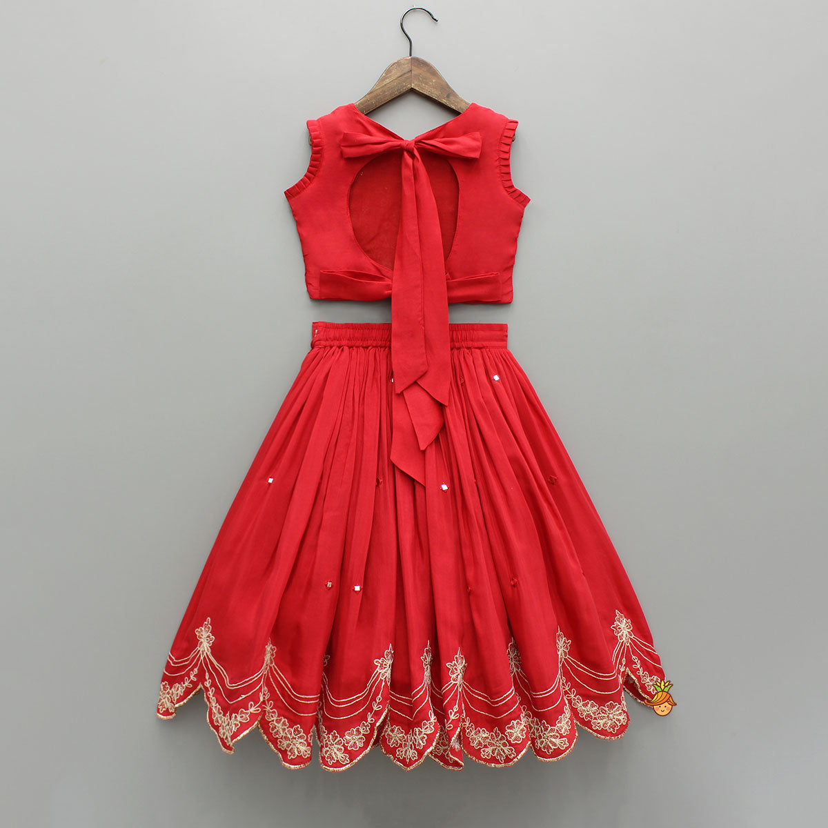 Pre Order: Dual Back Knot Detail Red Top And Tassels Enhanced Lehenga