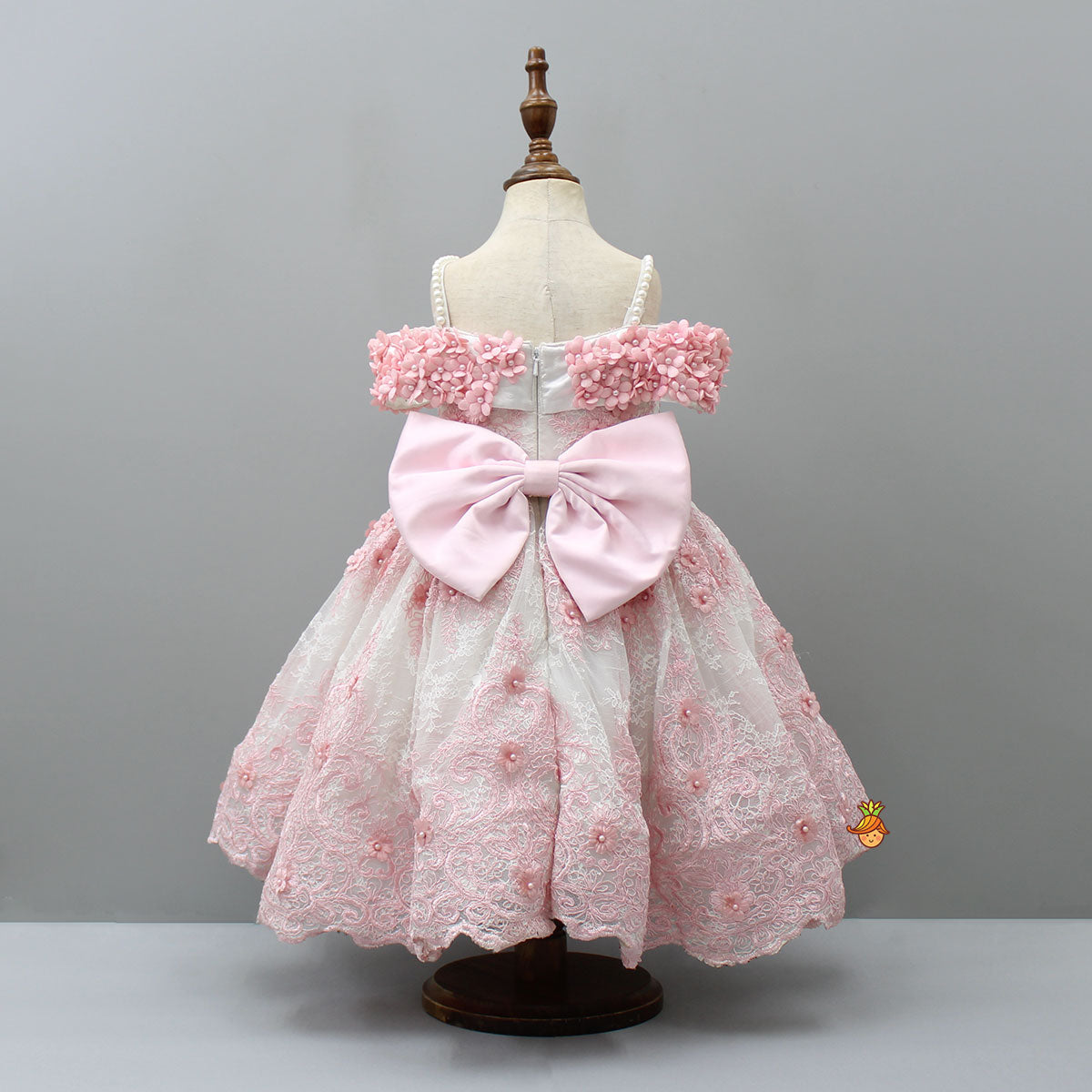 Off Shoulder Fabric Flowers Adorned Wings Gown With Detachable Trail And Matching Hair Clip