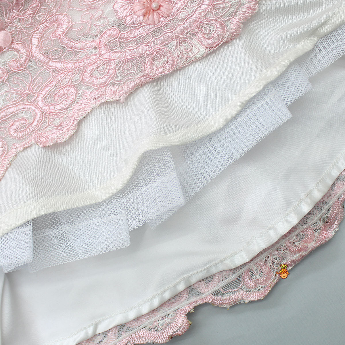 Off Shoulder Fabric Flowers Adorned Wings Gown With Detachable Trail And Matching Hair Clip