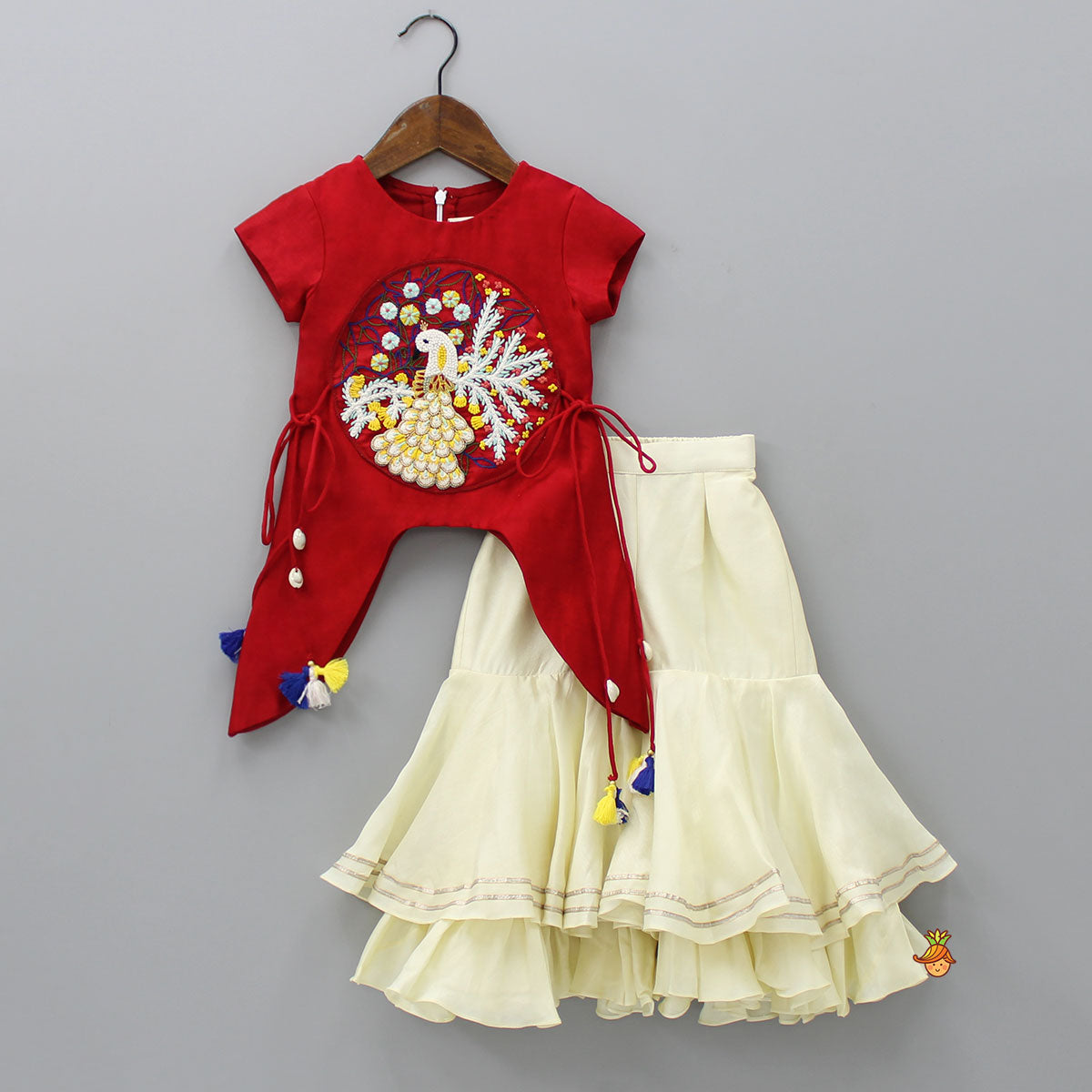 Pre Order: Peacock Embroidered Side Knot Detail Stylish Red Top And Layered Cream Sharara