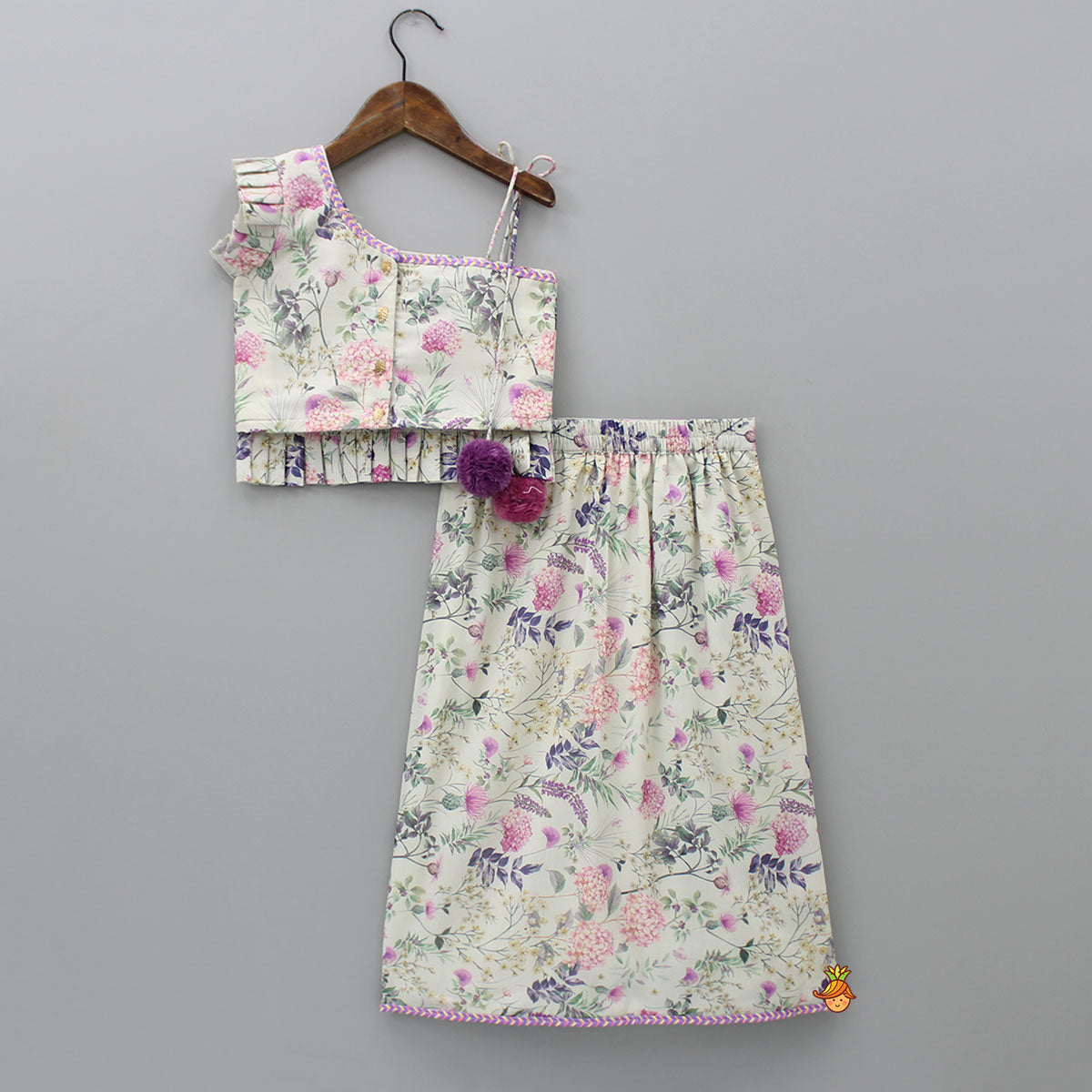 Pre Order: Floral Printed One Shoulder Top And Stylish Front Cut Lehenga With Ruffle Dupatta