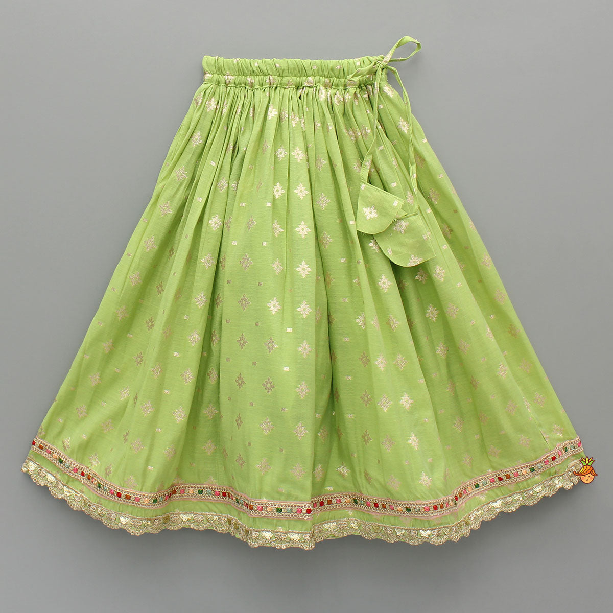 Pre Order: Pleated Hem Green Chanderi Embroidered Top And Lehenga With Net Dupatta
