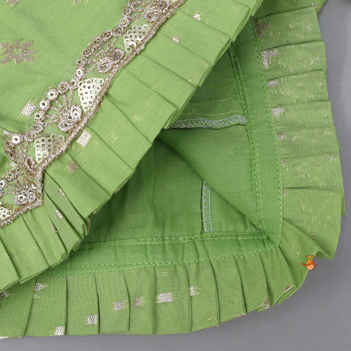 Pre Order: Pleated Hem Green Chanderi Embroidered Top And Lehenga With Net Dupatta