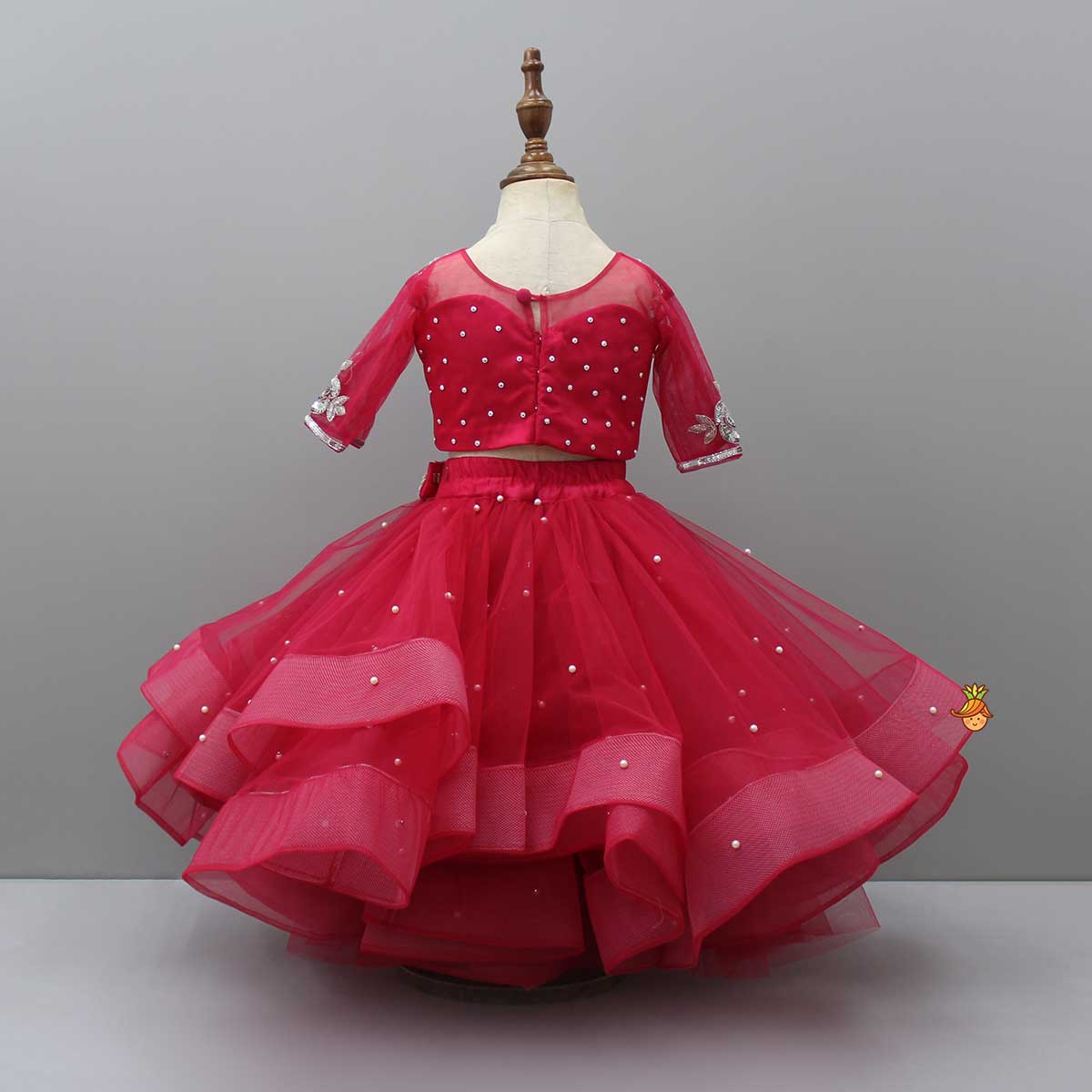 Pre Order: Pink Embroidered Crop Top And Net Layered Lehenga