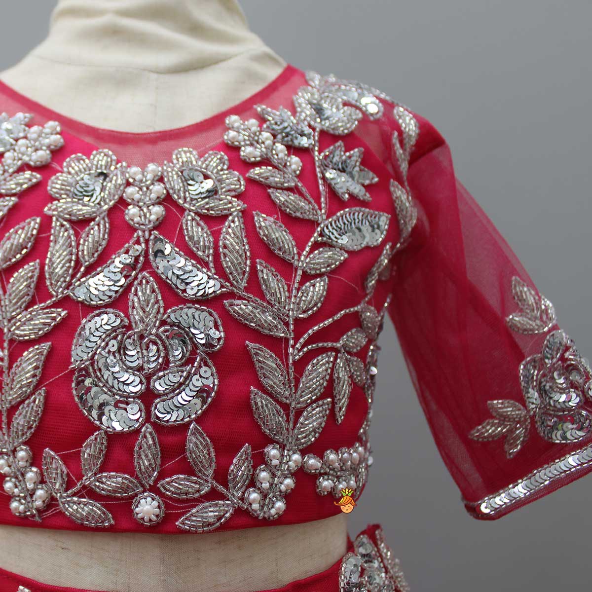 Pre Order: Pink Embroidered Crop Top And Net Layered Lehenga