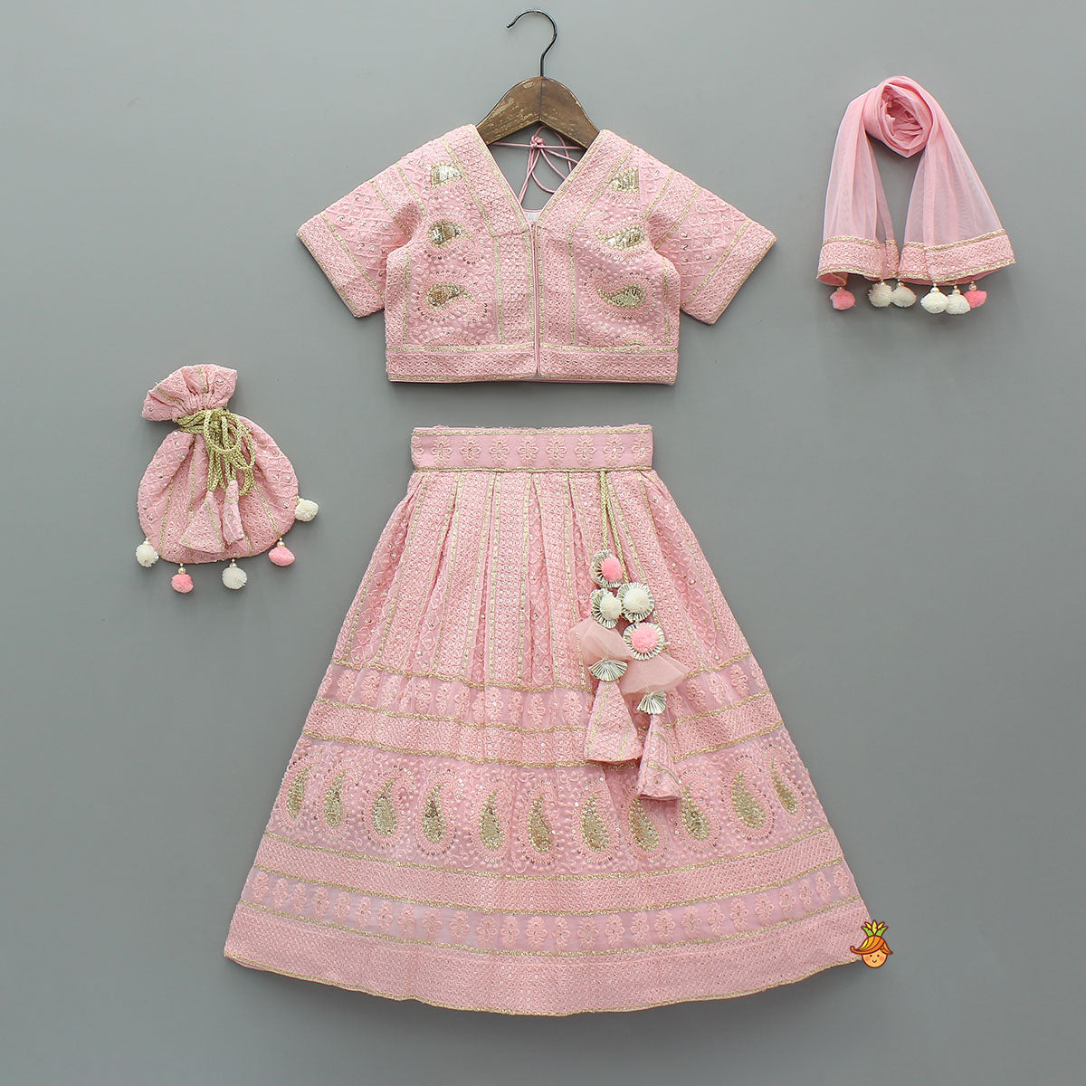 Pre Order: Embroidered Top And Lehenga With Matching Potli And Net Dupatta