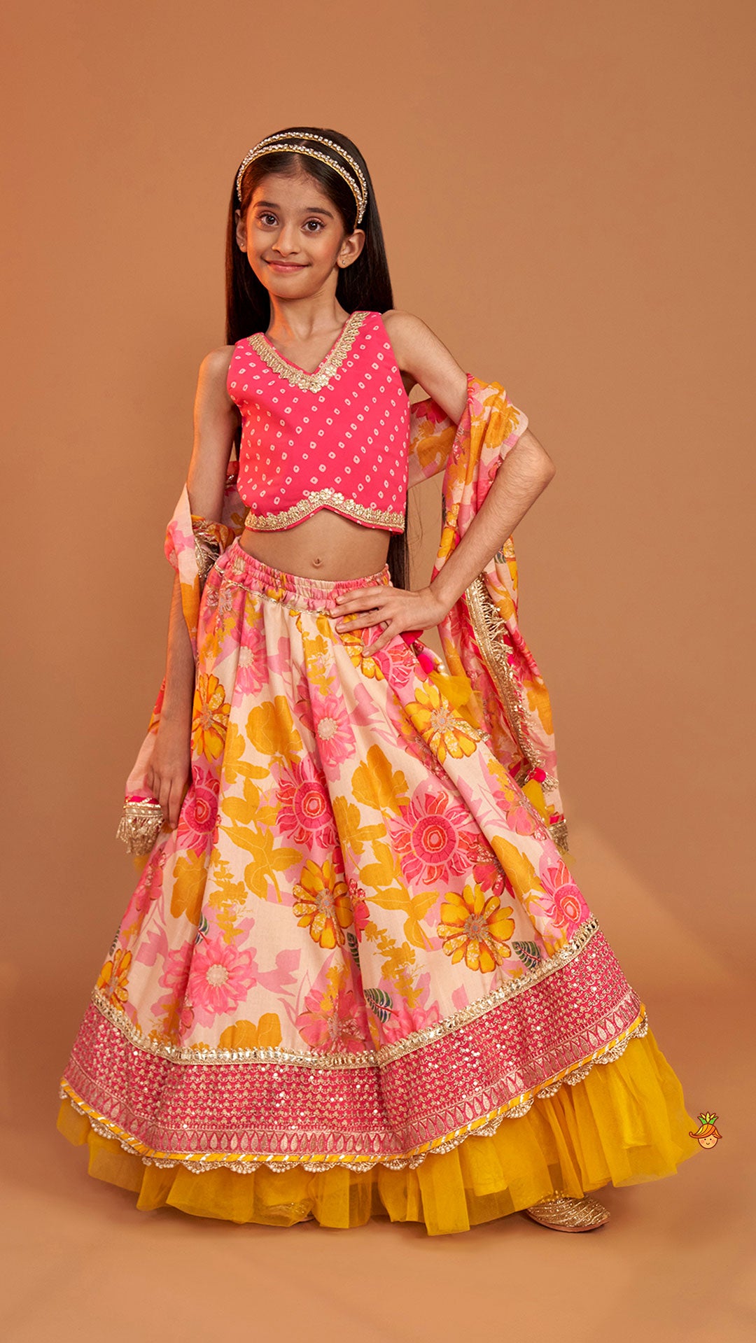 Pre Order: Bandhani Printed Top And Floral Printed Layered Lehenga With Matching Dupatta