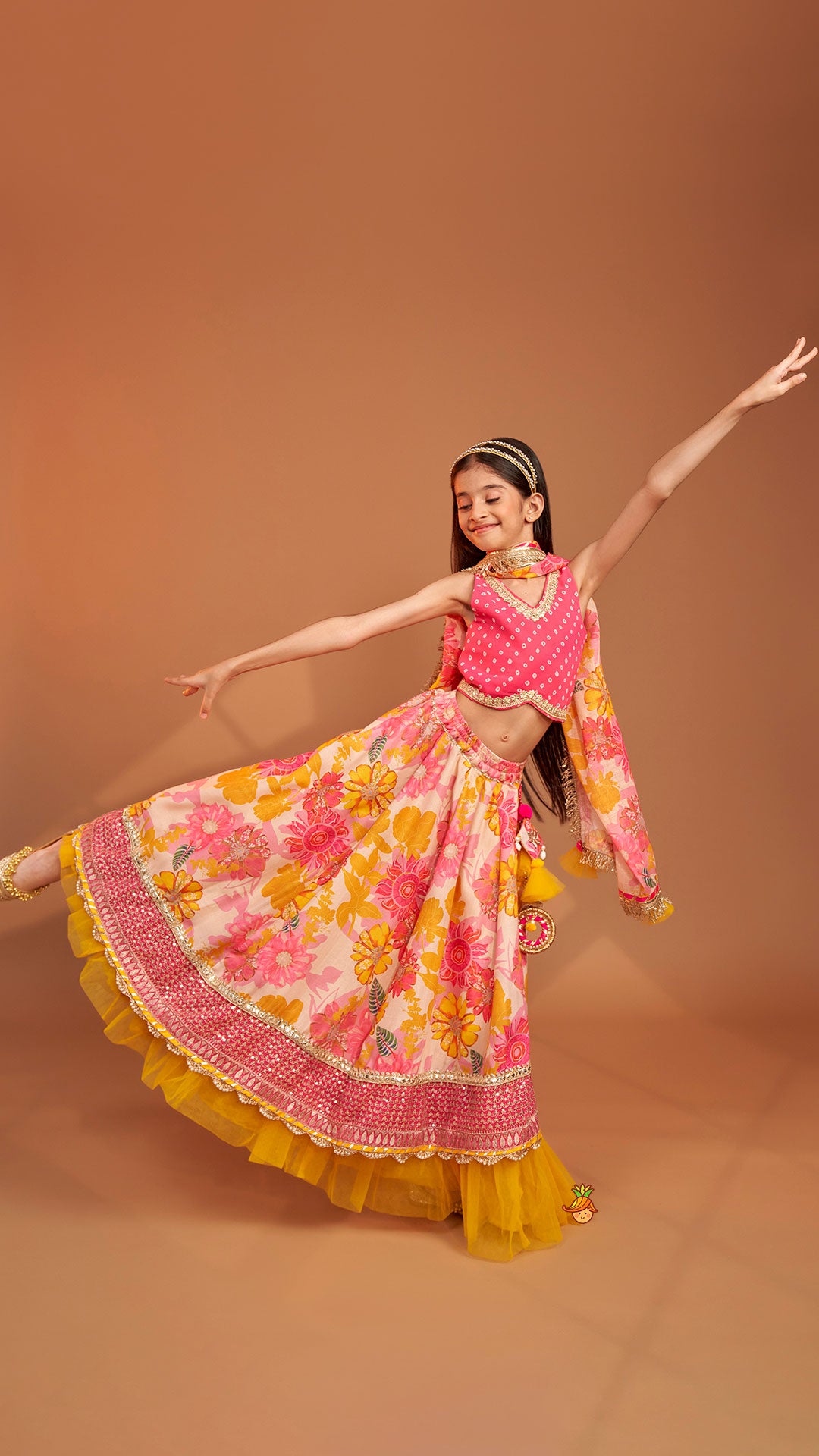 Pre Order: Bandhani Printed Top And Floral Printed Layered Lehenga With Matching Dupatta