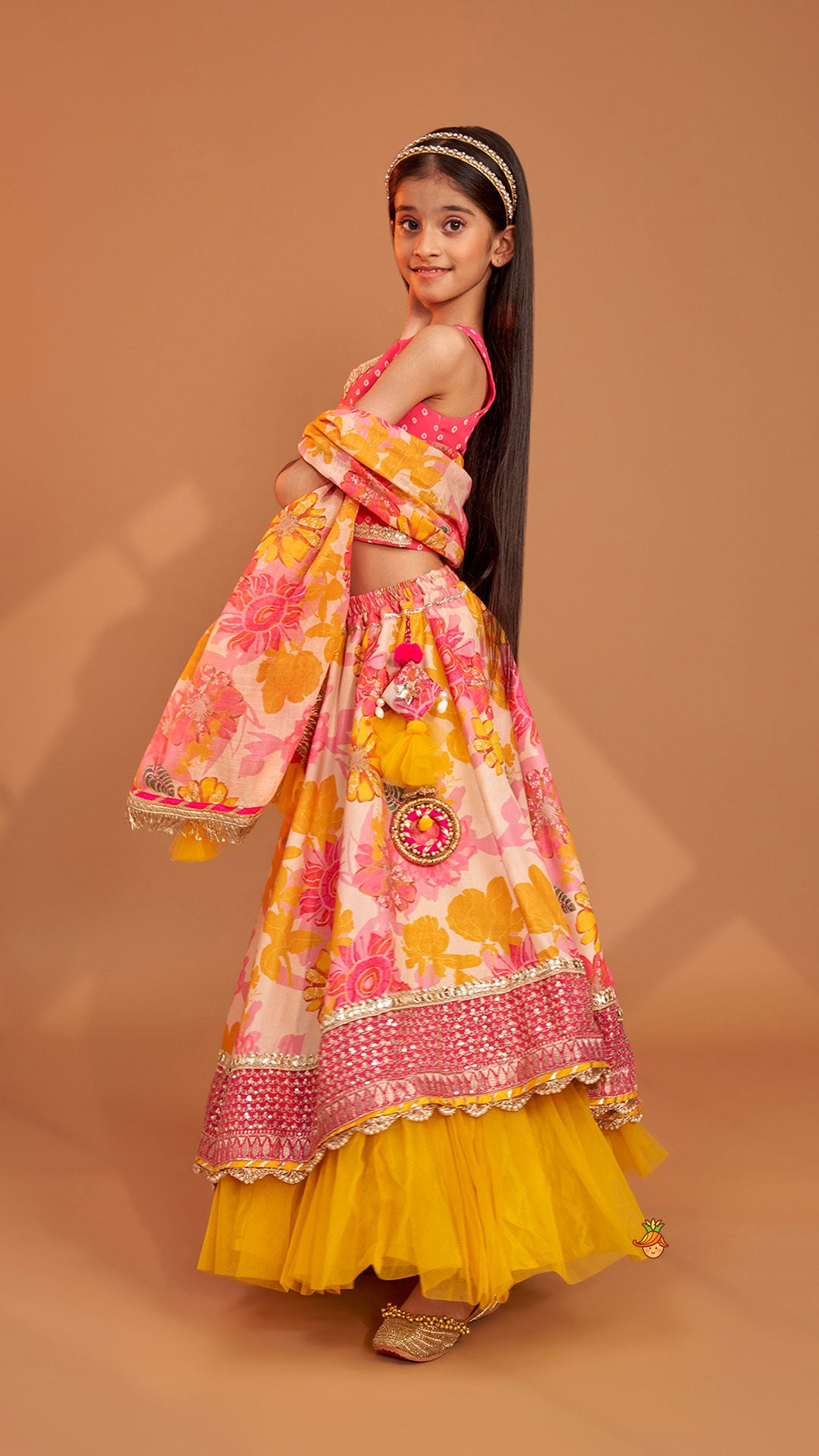 Pre Order: Bandhani Printed Top And Floral Printed Layered Lehenga With Matching Dupatta