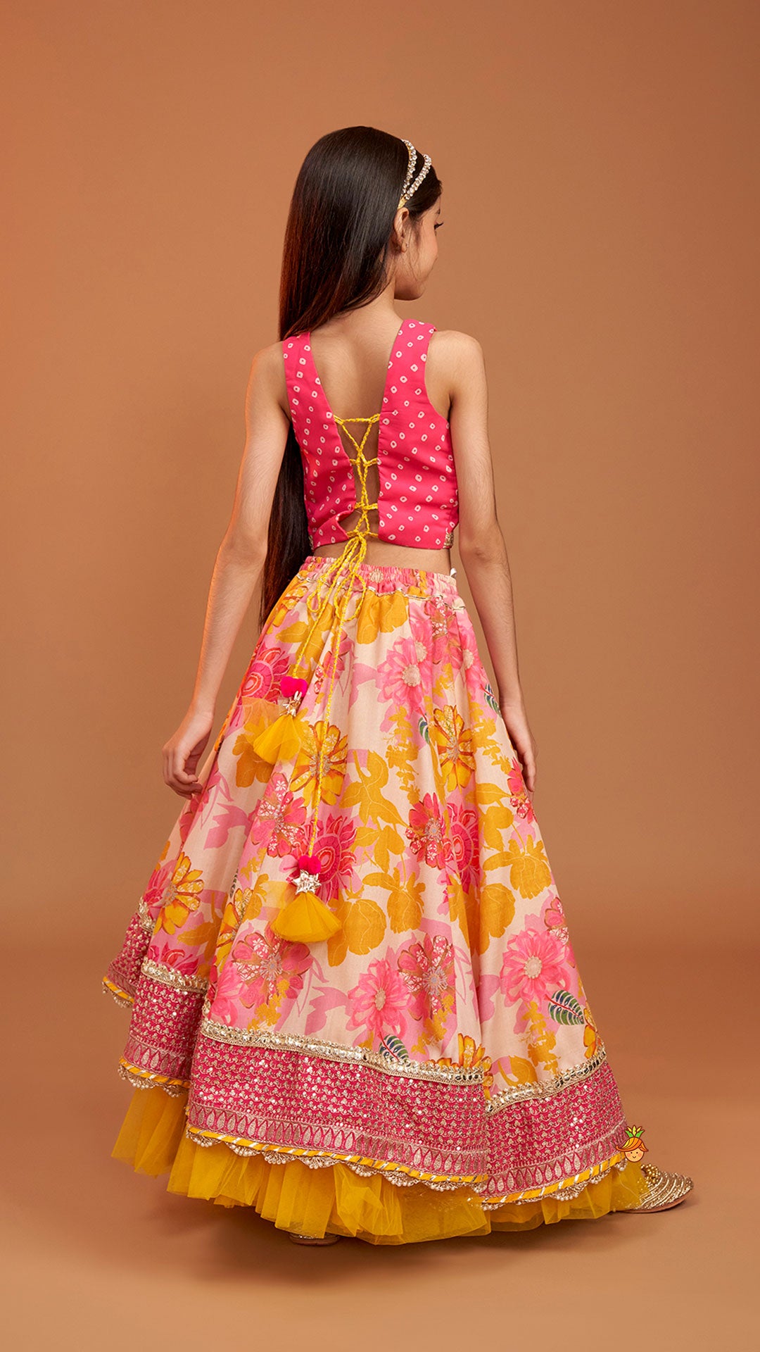Pre Order: Bandhani Printed Top And Floral Printed Layered Lehenga With Matching Dupatta