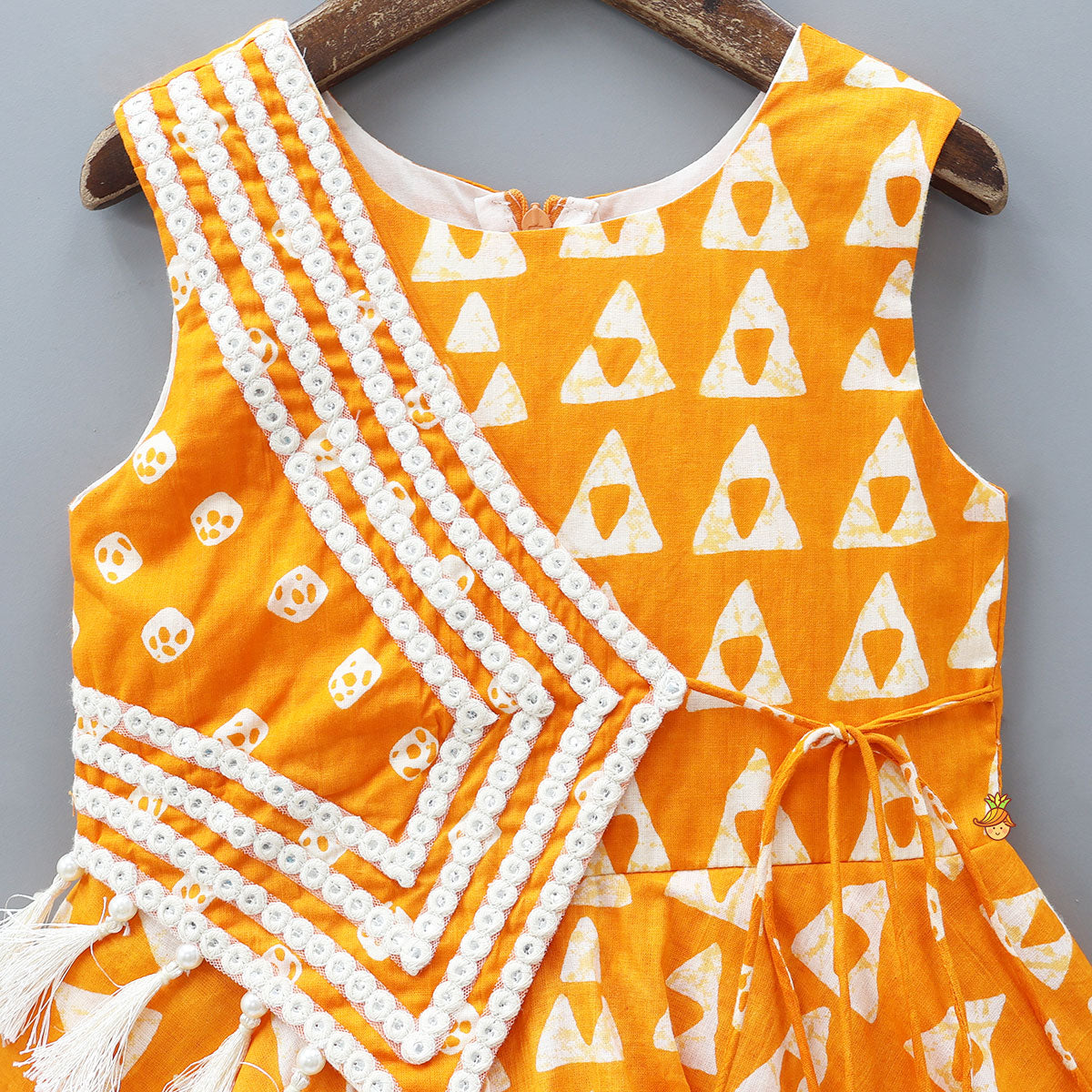 Pre Order: Orange Printed Kurti With Faux Mirror Work Flap