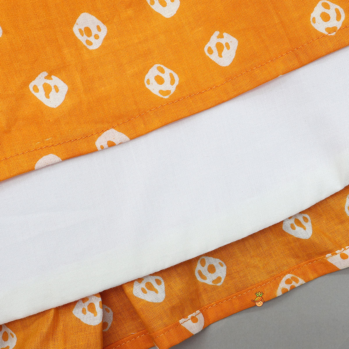 Pre Order: Orange Printed Kurti With Faux Mirror Work Flap