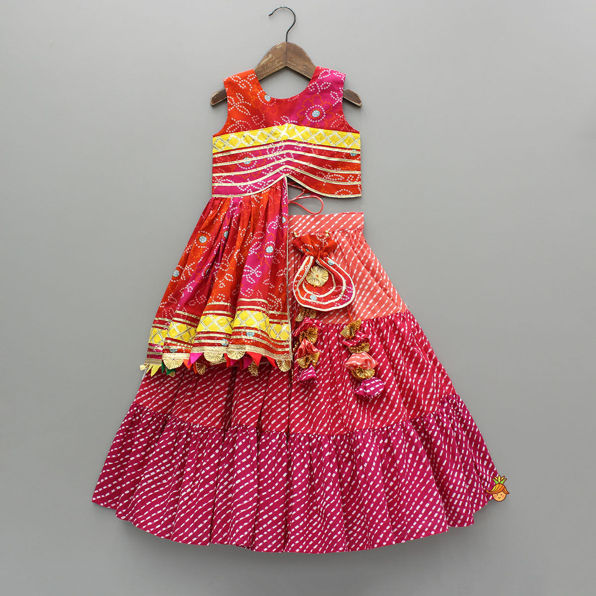 Pre Order: Printed Stylish Kurti And Lehenga With Attached Matching Potli And Dupatta
