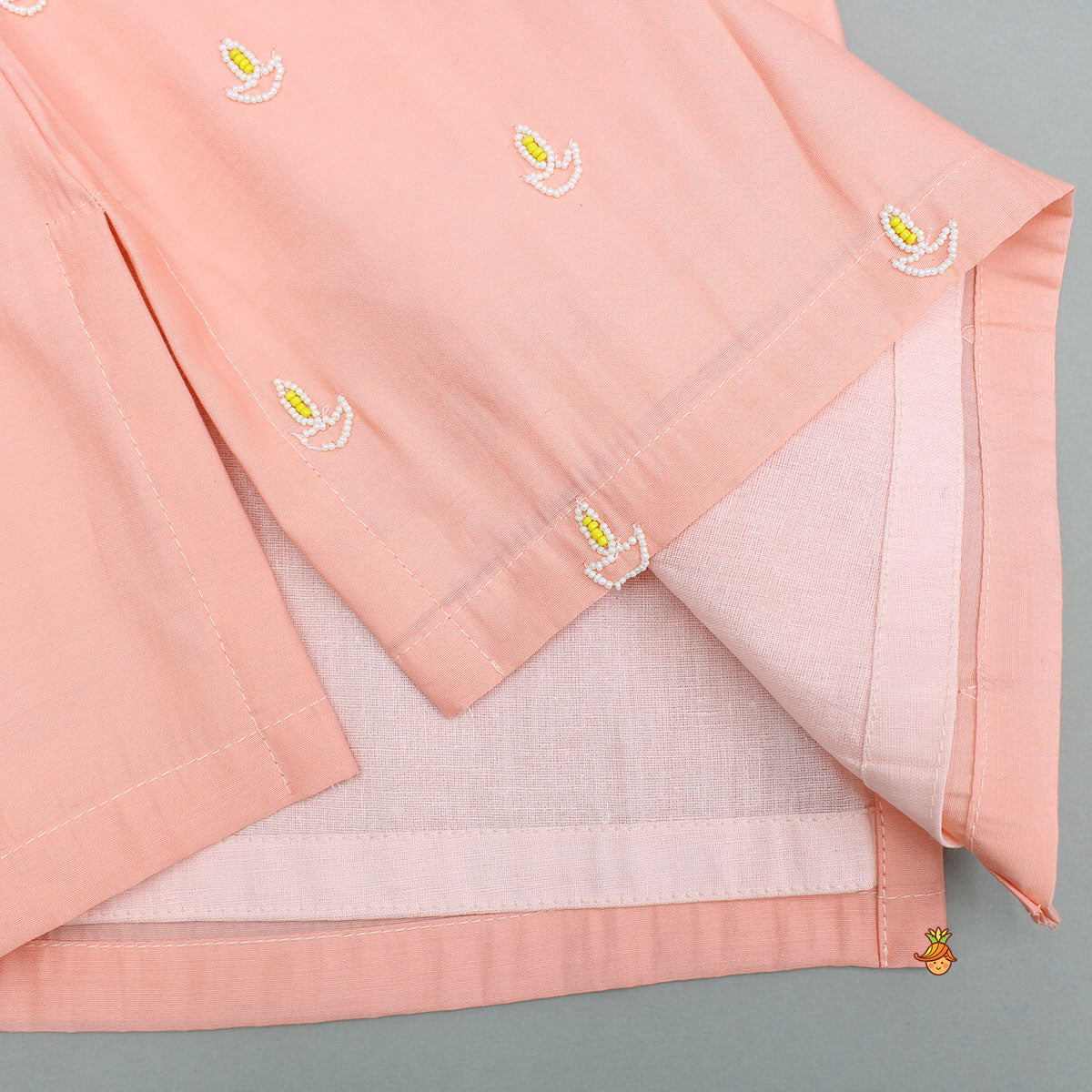 Pre Order: Diya Embroidered Peach Kurta And Churidar