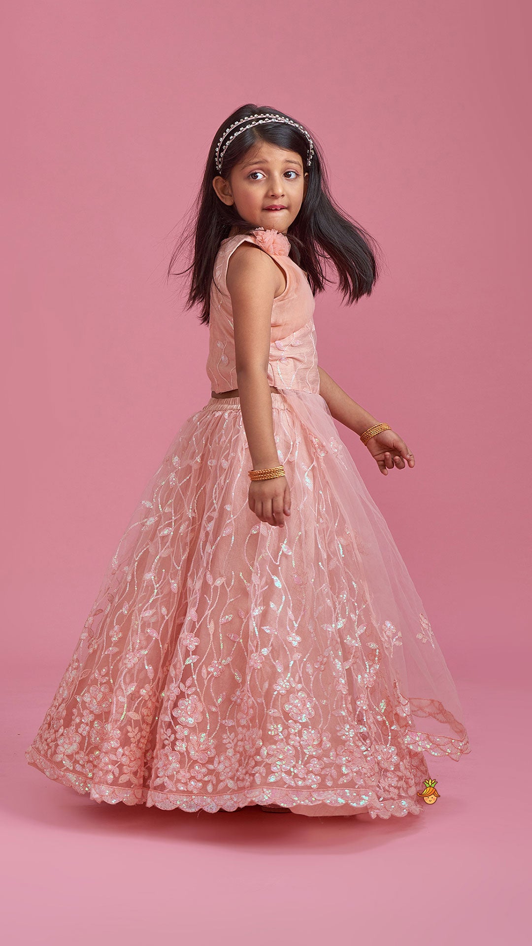 Pre Order: Elegant Peach Drape Top And Sequins Embroidered Lehenga