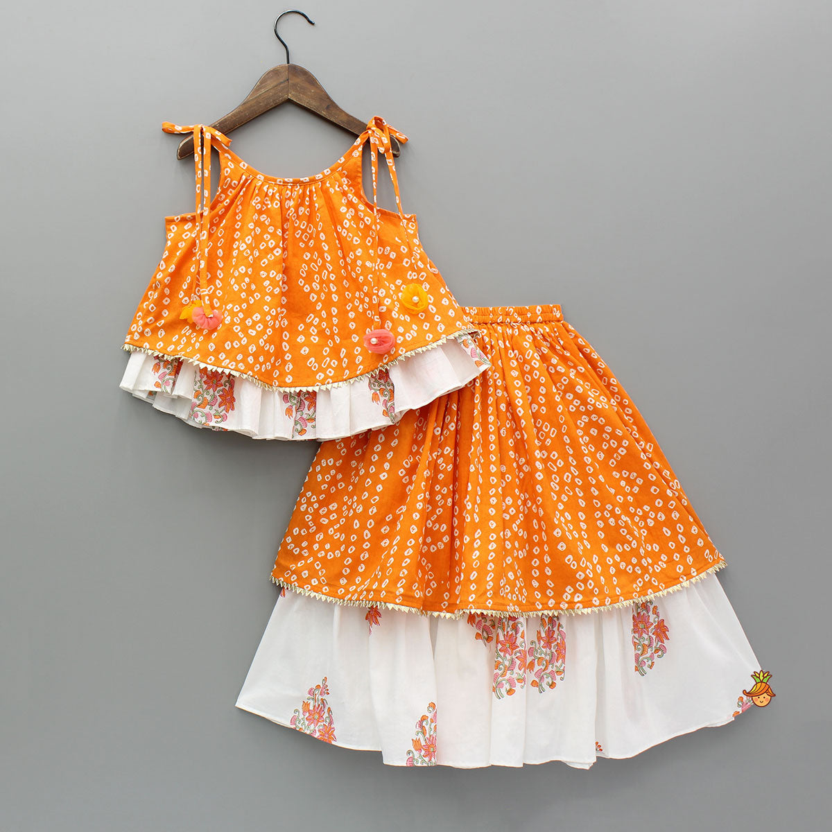 Pre Order: Bandhani Printed Tie Up Strap Top And Lehenga