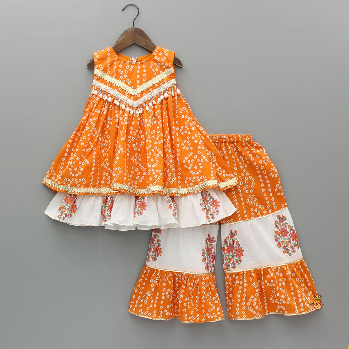 Pre Order: Bandhani Floral Printed Layered Kurti With Tiered Style Sharara And Dupatta