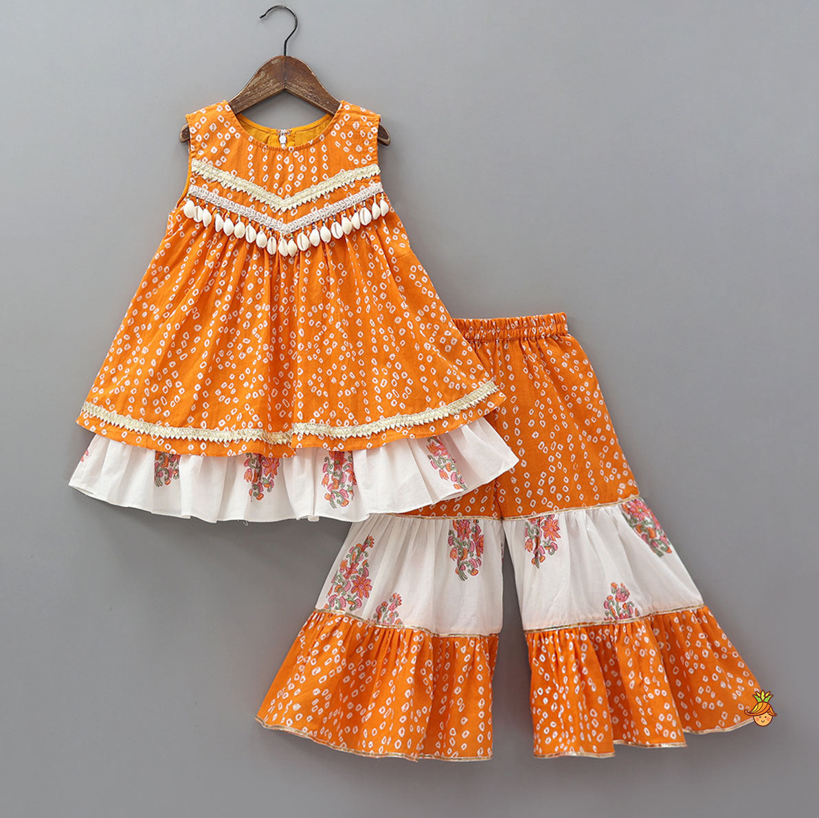 Pre Order: Bandhani Floral Printed Layered Kurti With Tiered Style Sharara And Dupatta