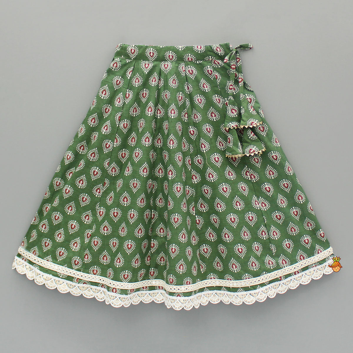 Pre Order: Green Printed Tie Up Strap Top And Lehenga
