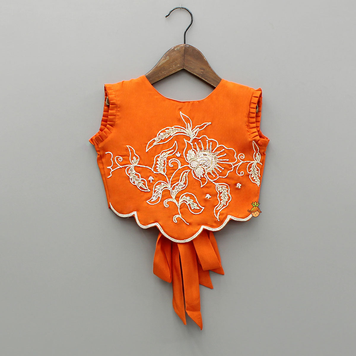 Pre Order: Orange Embroidered Dual Back Knot Detailed Top And Lehenga With Scalloped Hem Detailing