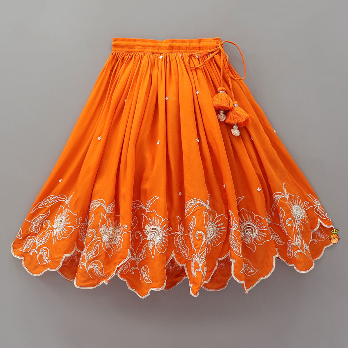 Pre Order: Orange Embroidered Dual Back Knot Detailed Top And Lehenga With Scalloped Hem Detailing