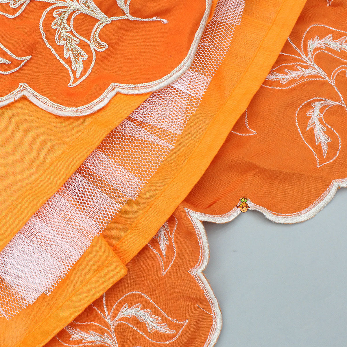 Pre Order: Orange Embroidered Dual Back Knot Detailed Top And Lehenga With Scalloped Hem Detailing
