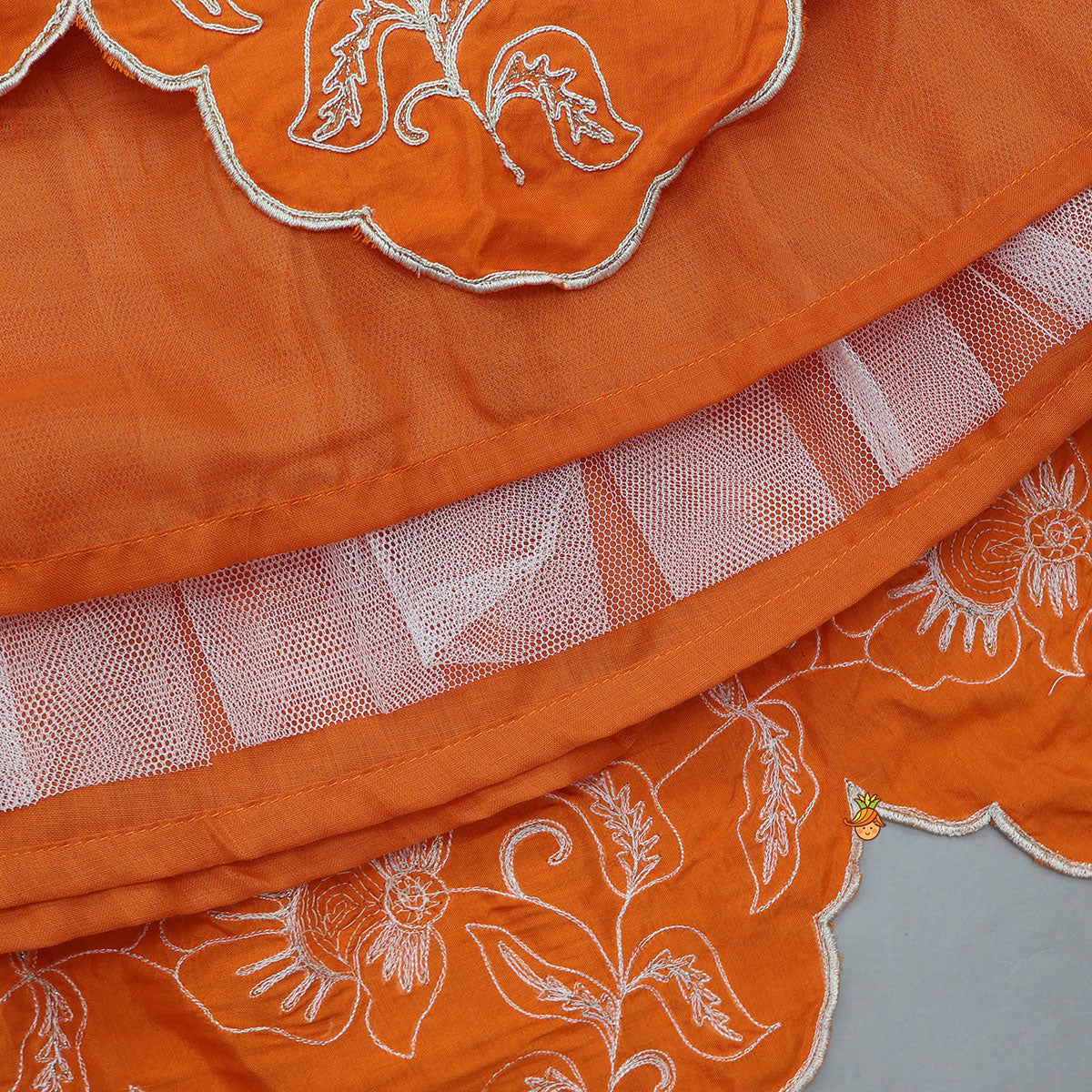 Pre Order: Orange Embroidered Dual Back Knot Detailed Top And Lehenga With Scalloped Hem Detailing