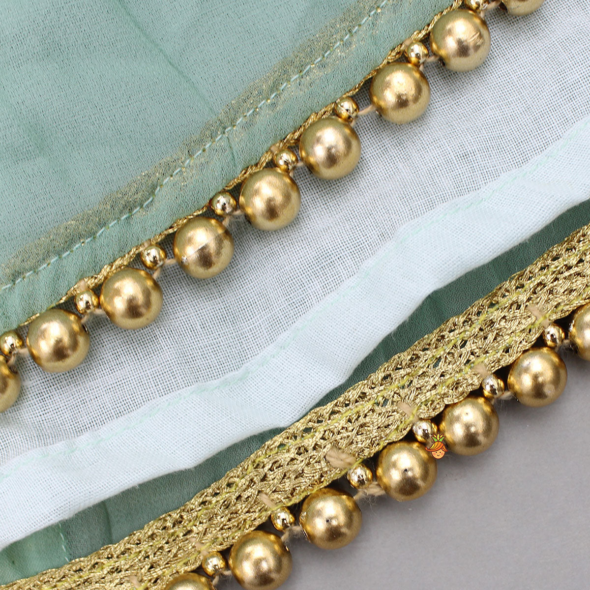 Pre Order: Green Dual Tone Embroidered Sleeves High Low Kurti