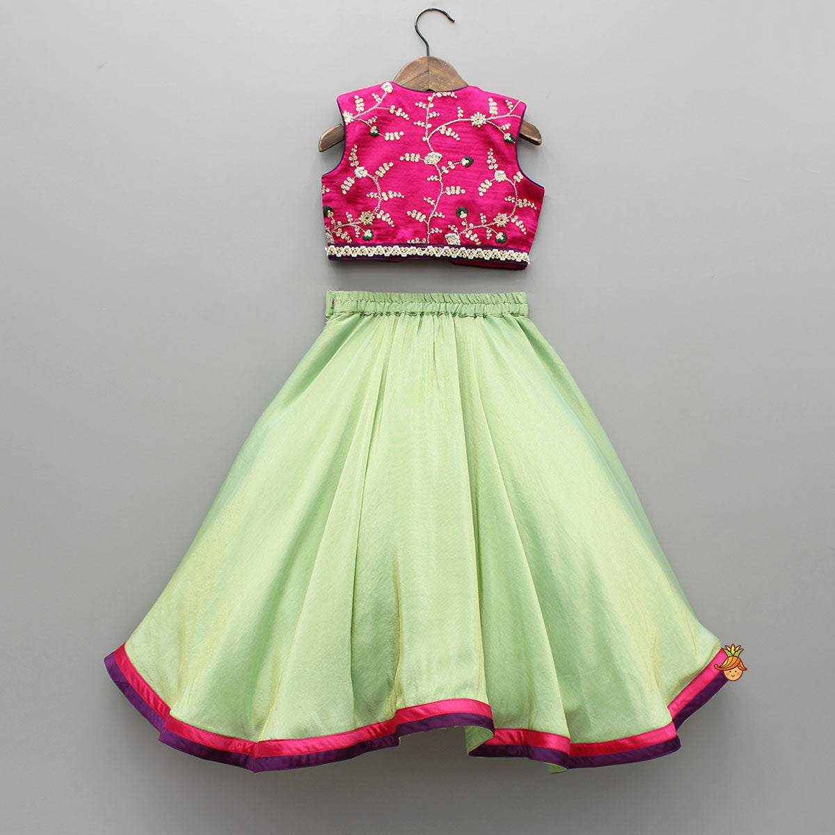 Pre Order: Pink Embroidered Top And Green Lehenga With Dupatta And Matching Potli Bag