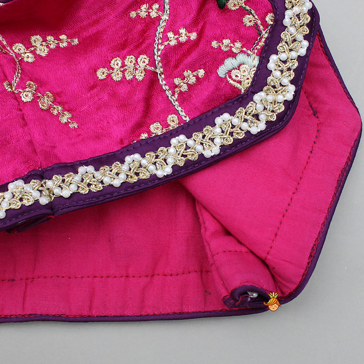 Pre Order: Pink Embroidered Top And Green Lehenga With Dupatta And Matching Potli Bag